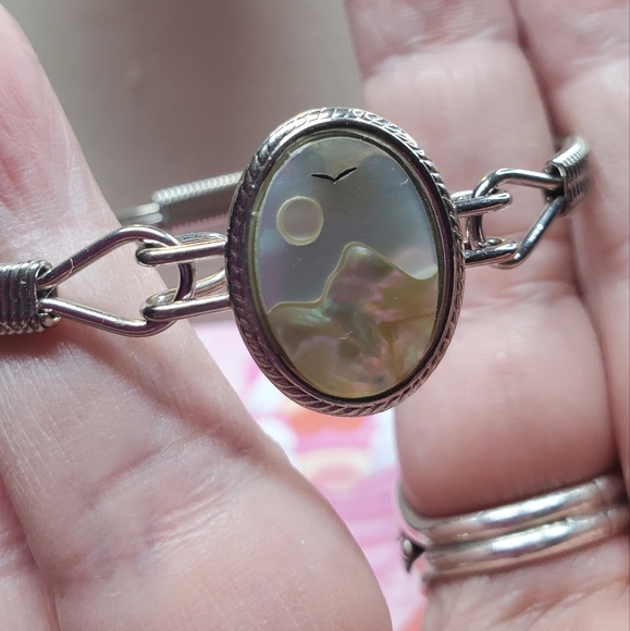 Silvertone bangle bracelet with a mother-of-pearl Inlay of a sun, bird & mountai - Picture 4 of 14